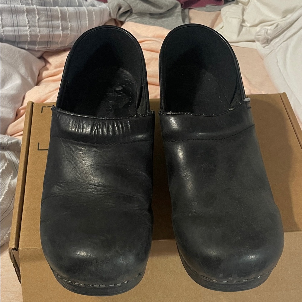 Dansko Black Leather Women's Slip-On Clogs